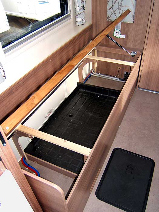 The room under the beds is very handy for storing larger items such as awnings.